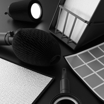 Various light shaping tools like reflectors and diffusers laid out on a clean surface, no text, no words, no typography, 8K, natural lighting